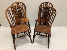 A harlequin set of four 19th century ash, elm and beech Windsor chairs