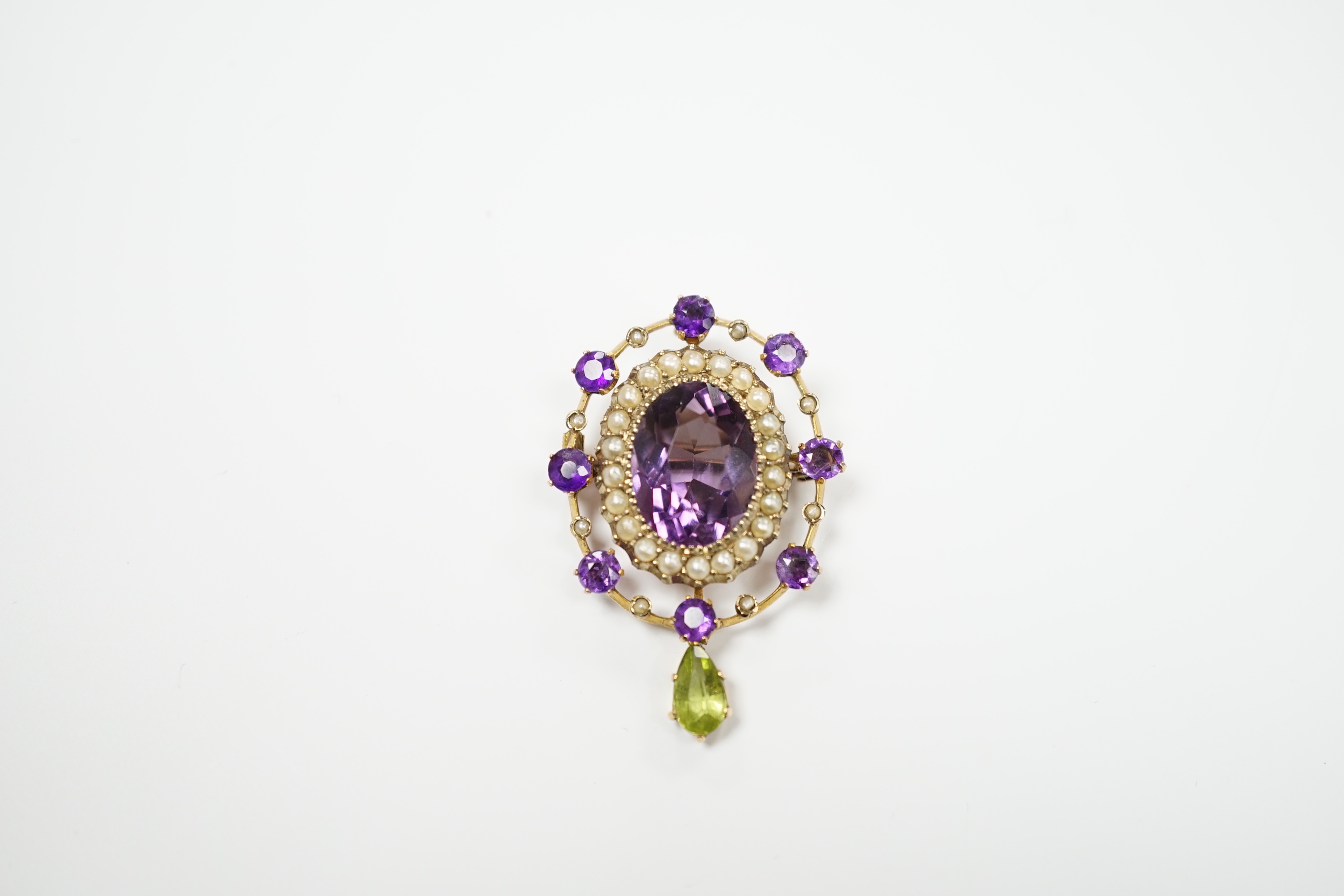 An early 20th century yellow metal, amethyst, peridot and seed pearl cluster set drop pendant - Image 2 of 5