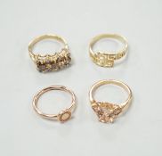 Three assorted modern 585 yellow metal and gem set rings, including two rose coloured and a 585 '
