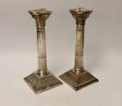 A pair of Elizabeth II silver Corinthian column candlesticks, Hampton Utilities, Birmingham, 1960,