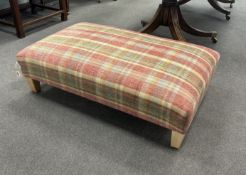 A contemporary rectangular footstool upholstered in Colefax and Fowler Magnus plaid, width 103cm,