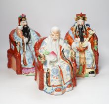A set of three Chinese famille rose figures of the Three Star Gods (Sanxing), largest 25cm high