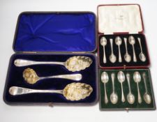 Three assorted cases of silver flatware, including two sets of six silver teaspoons and a 19th
