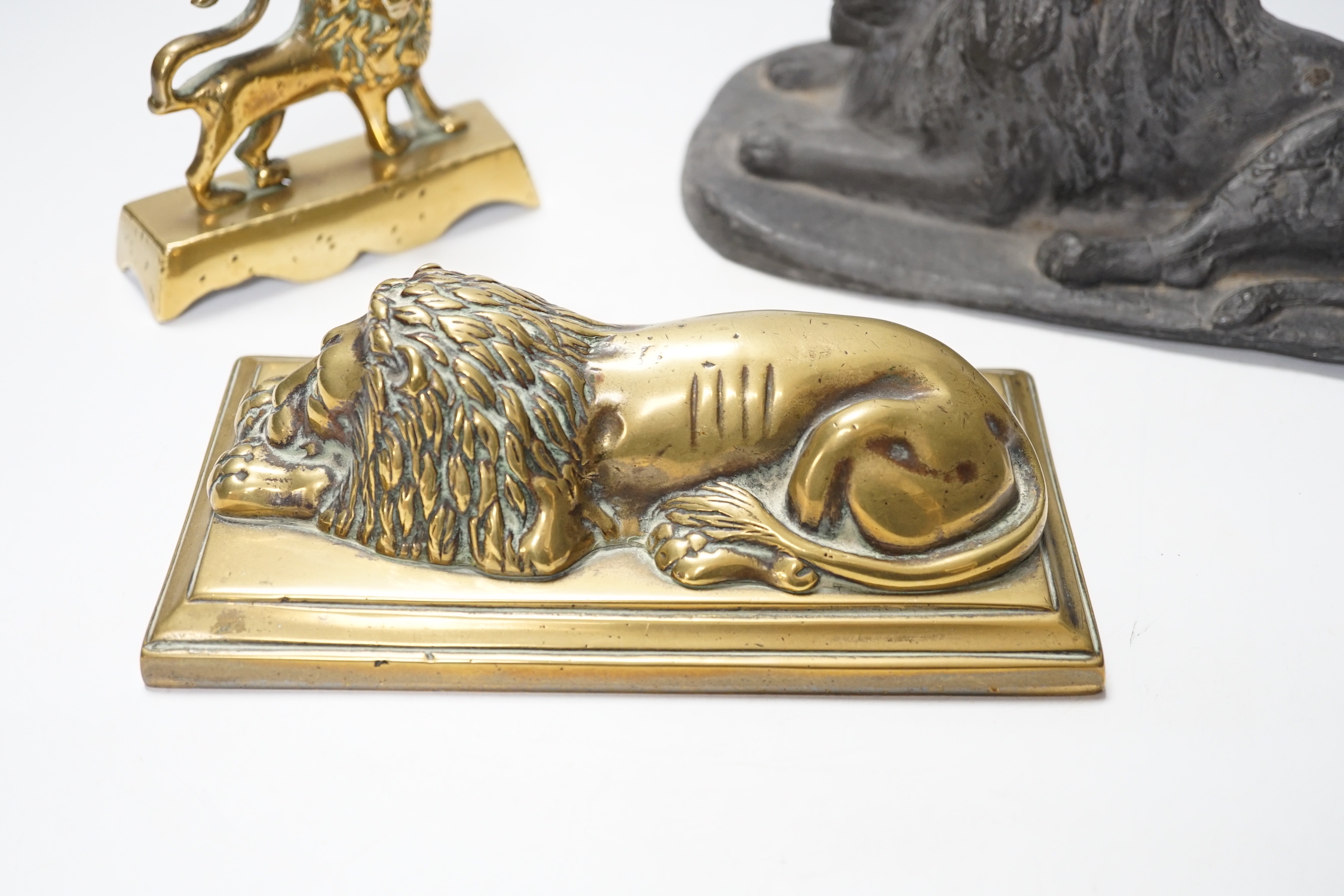 A 19th century brass recumbent lion, a similar cast iron lion and a smaller lion, largest 22cm wide - Image 2 of 5