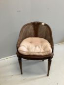 A Louis XVI style caned bergere tub chair, width 50cm, height 74cm