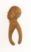 A Treen nutcracker in the form of a gentleman, inscribed ‘Chamonix’, 20cm high