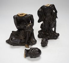 Two Chinese pottery figures of luohan, damaged, 15.5cm