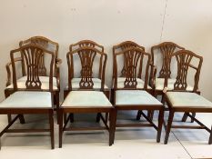 A set of eight George III style mahogany dining chairs, two with arms