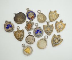 Twelve assorted mainly mid 20th century silver medals, including running and swimming (three with