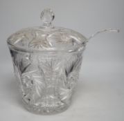 A large and heavy slice-cut lead crystal punch jar and cover, together with a ladle, 33cm