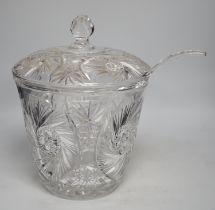 A large and heavy slice-cut lead crystal punch jar and cover, together with a ladle, 33cm