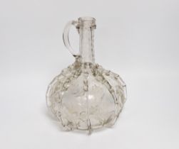 An 18th century Dutch engraved glass decanter, 24cm high