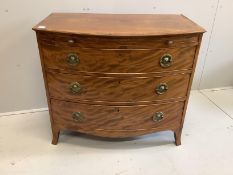 A Regency mahogany bow front chest of three drawers, fitted slide, width 98cm, depth 59cm, height