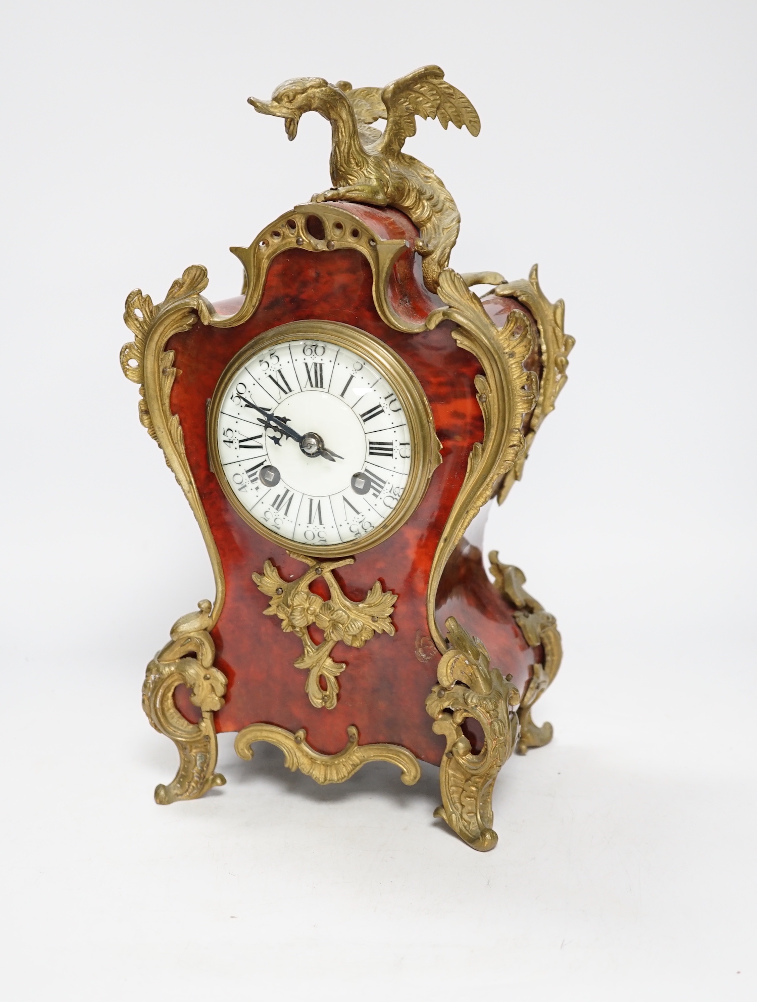 An early 20th century French tortoiseshell mantel clock with dragon mount, 30cm