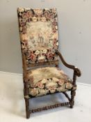 An upholstered 18th century style French walnut elbow chair, width 62cm, depth 78cm, height 122cm