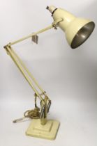 A cream Herbert Terry anglepoise table lamp, fully extends to 92cm