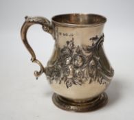 A Victorian embossed silver baluster mug, Charles Boyton II, London, 1866?, height 13cm, 8.6oz.