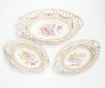 A trio of Dresden pierced floral painted porcelain oval baskets,