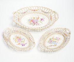 A trio of Dresden pierced floral painted porcelain oval baskets,