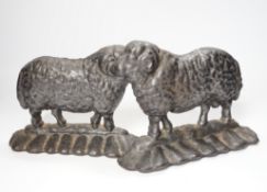 Two 19th century cast iron door stop sheep, tallest 19cm high