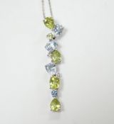 A modern 9ct white gold, peridot and blue topaz set pendant, 37mm, on a 375 chain, 40cm, gross