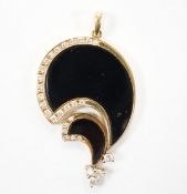A Hong Kong 585 yellow metal, black onyx and diamond set stylised pendant, 43mm, gross weight 12.1