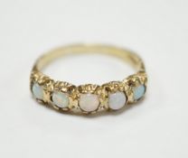 A modern 9ct gold and five stone white opal set half hoop ring, size T/U, gross weight 2.9 grams.