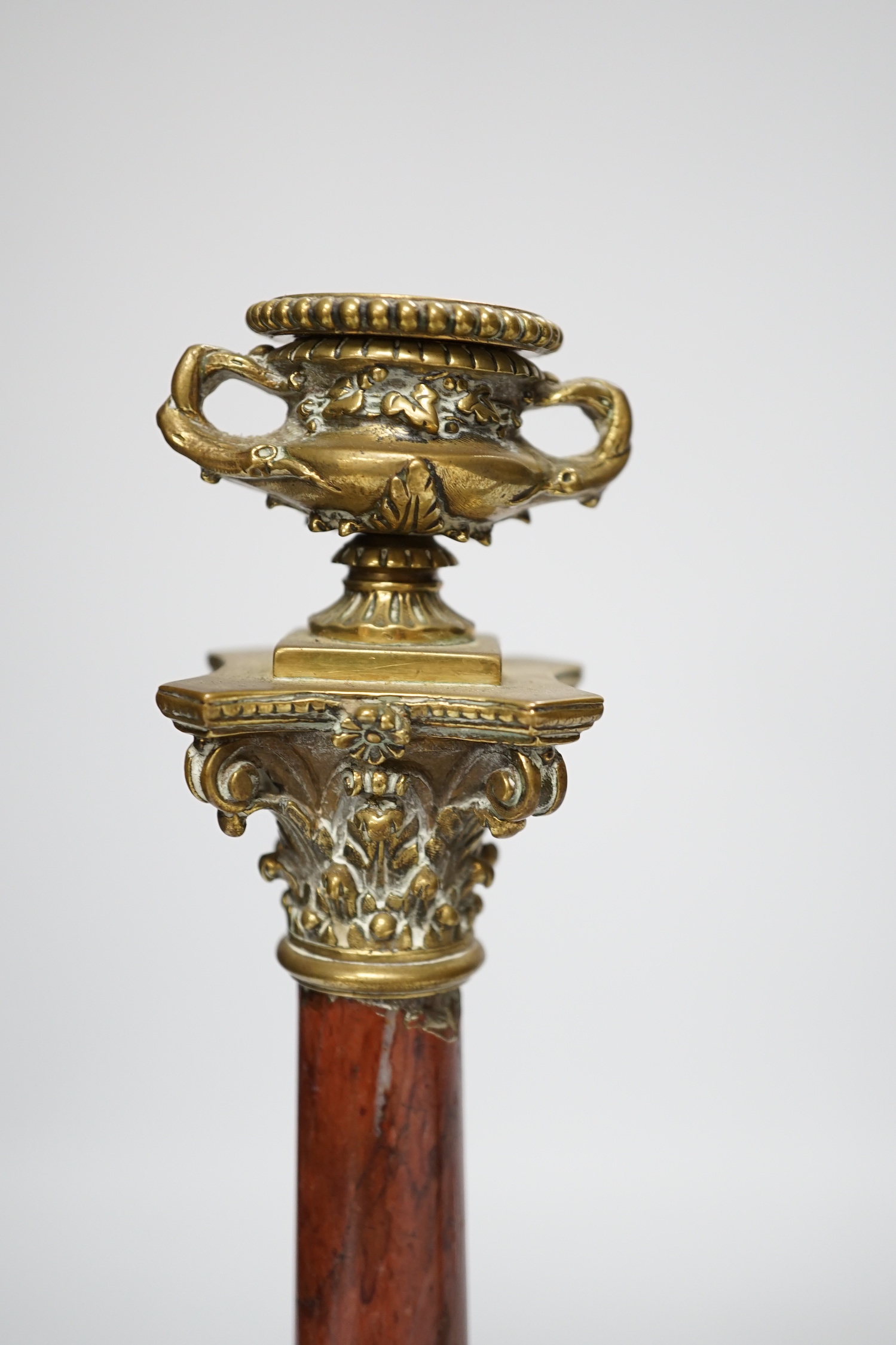 A pair of 19th century brass mounted rouge marble candlesticks, 29cm (a.f.) - Image 3 of 5