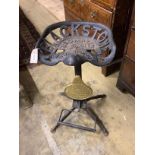 A cast iron tractor seat stool, height 70cm