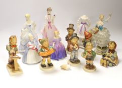 Two Doulton figures, three Worcester figures, Goebel figures and a continental figure