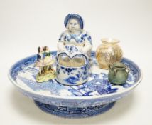A group of mixed ceramics including a Moser crackle glass fish vase, Delft seated lady figurine,