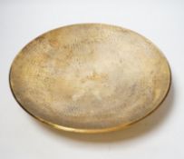 A modern planished silver gilt shallow dish, on circular foot, maker TS, London, 1996, 28.2cm, 24.