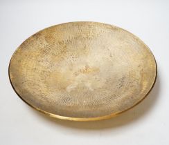 A modern planished silver gilt shallow dish, on circular foot, maker TS, London, 1996, 28.2cm, 24.