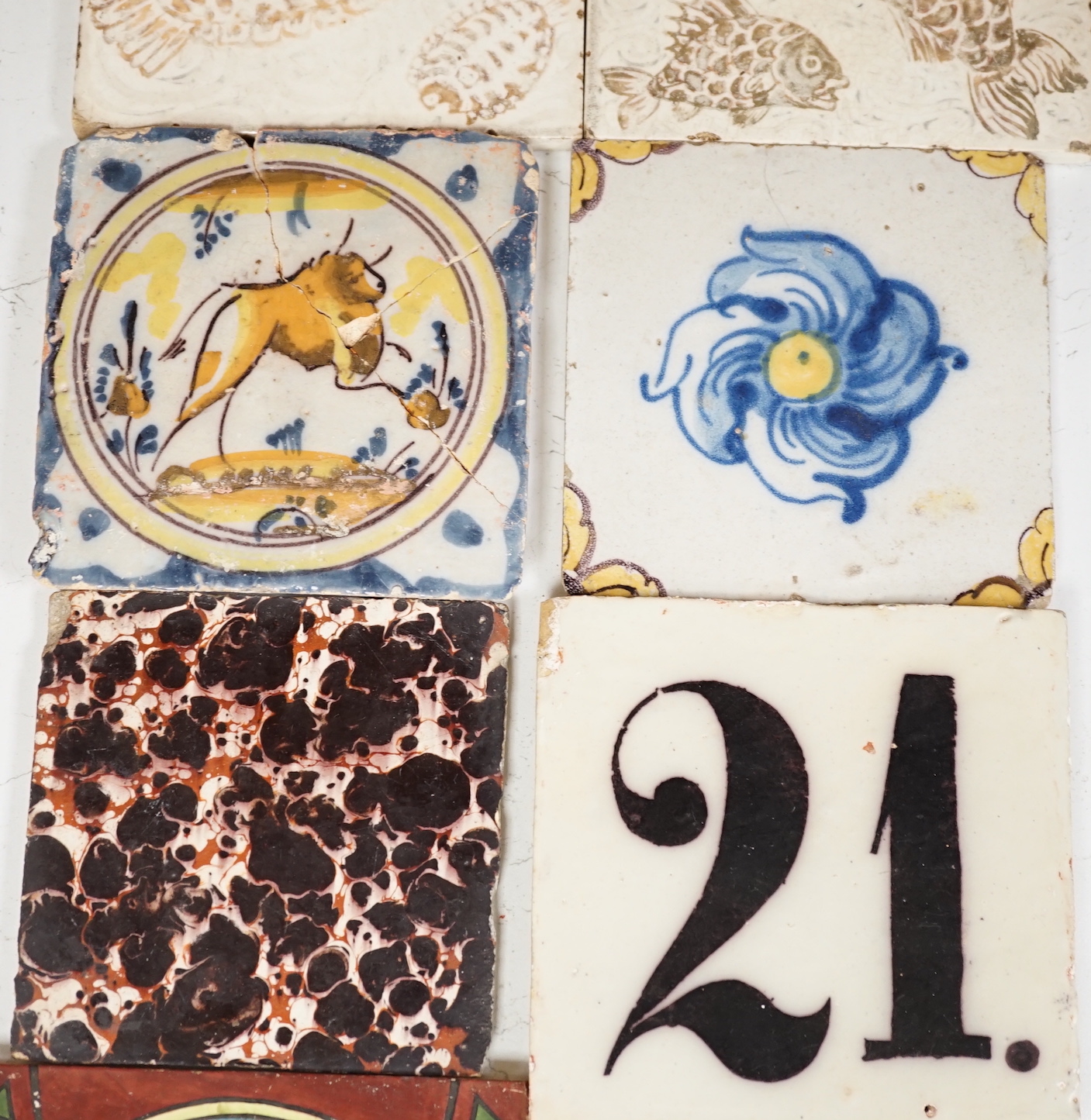 A collection of Continental tiles including 17th & 18th century Delft, Pre-Raphaelite style and
