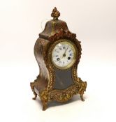 An early 20th century French red boulle work mantel clock by LeRoy, 30cm