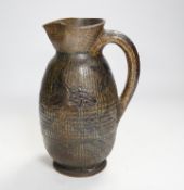 A R W Martin Brothers, London and Southall stoneware jug, repaired, mark to base, 22cm high