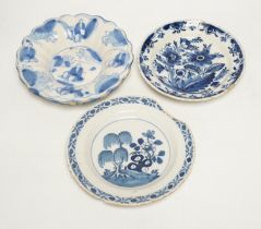 A Delft lobed blue and white dish, 1680-1700 and two 18th century Delft plates, largest 21cm in