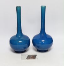 A pair of Japanese or Chinese blue monochrome bottle vases, c.1900 and a Japanese cloisonné enamel