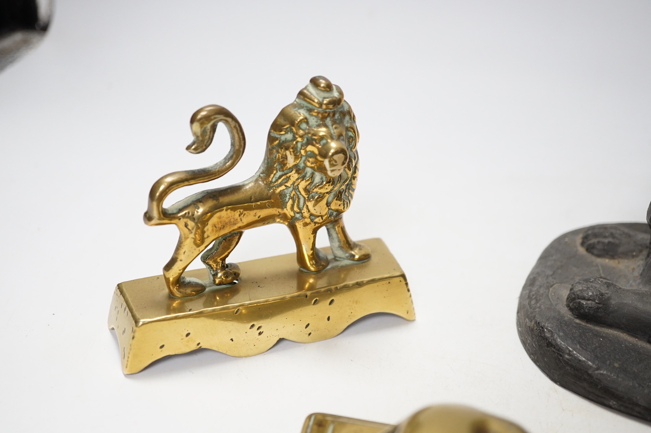 A 19th century brass recumbent lion, a similar cast iron lion and a smaller lion, largest 22cm wide - Image 5 of 5