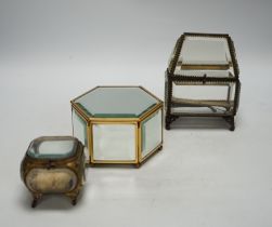 Three bevelled glass trinket boxes, tallest 15cm