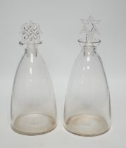 Two R. Lalique decanters, one with a Celtic knot stopper, the other the Star of David, tallest
