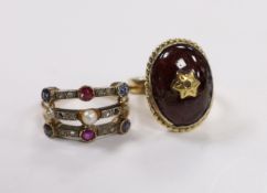 A late Victorian yellow metal, ruby sapphire, diamond and seed pearl set half hoop triple shank