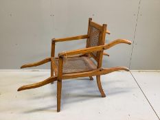 A Victorian caned beech invalid's chair, width 58cm, length 150cm, height 96cm