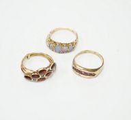 Two recent 9ct gold and gem set rings, including graduated five stone opal half hoop ring,