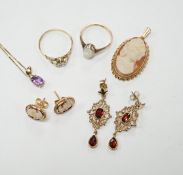 Two 9ct and gem set rings, including diamond chip and white opal, a 9ct and amethyst set pendant