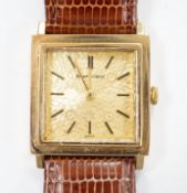 A gentleman's 9ct gold Bueche Girod manual wind square cased dress wrist watch, on a leather strap.