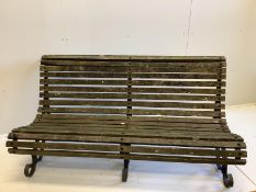 A wrought iron slatted wood garden bench, length 153cm, depth 80cm, height 78cm