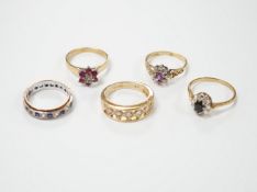 Five assorted modern 9ct gold and gem set dress rings including ruby and diamond cluster and six