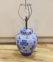 A Chinese blue and white jar and cover (converted to a desk lamp) (A/F), jar and cover 38 cm high