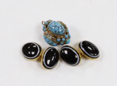 A pair of early 20th century yellow metal (stamped 15) and oval banded agate cufflinks and a